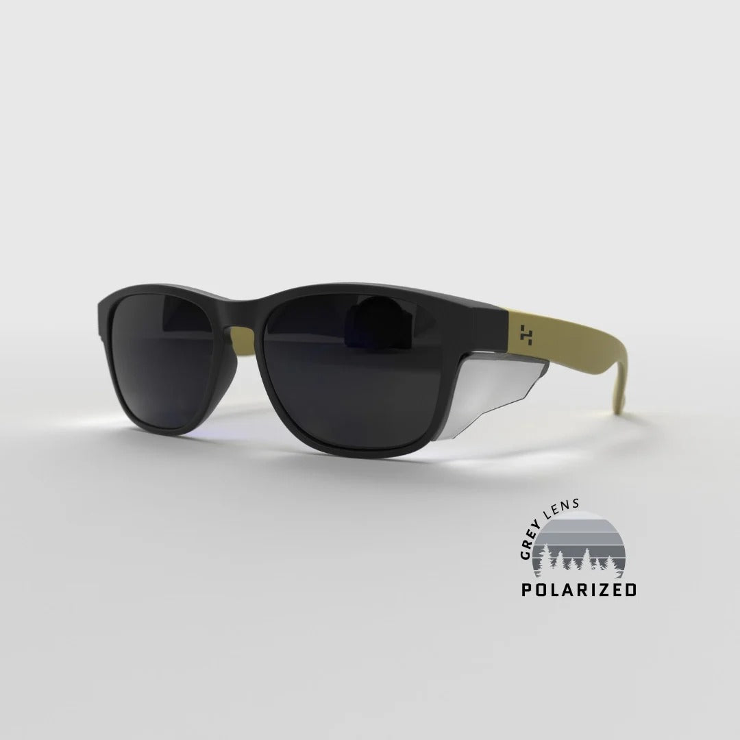 Hyspecs Serie ICON transparente con lente polarizada gris y protectores laterales