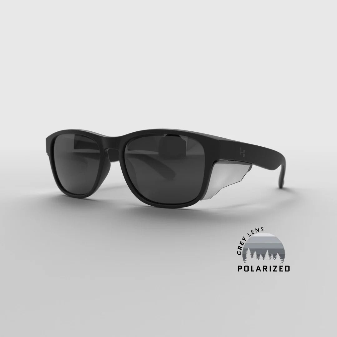 Hyspecs Serie ICON transparente con lente polarizada gris y protectores laterales
