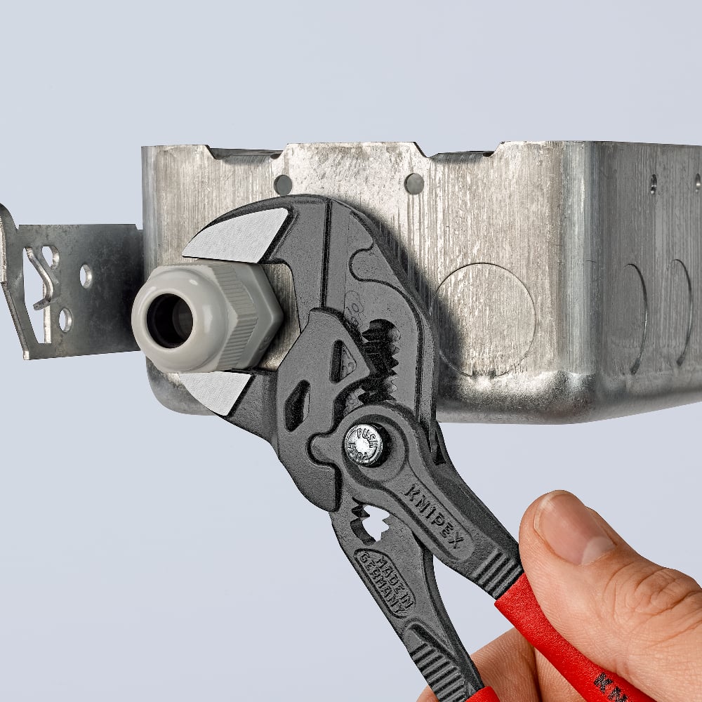 Smooth-jawed KNIPEX 86 01 180 pliers wrench ensures damage-free work on chrome surfaces.