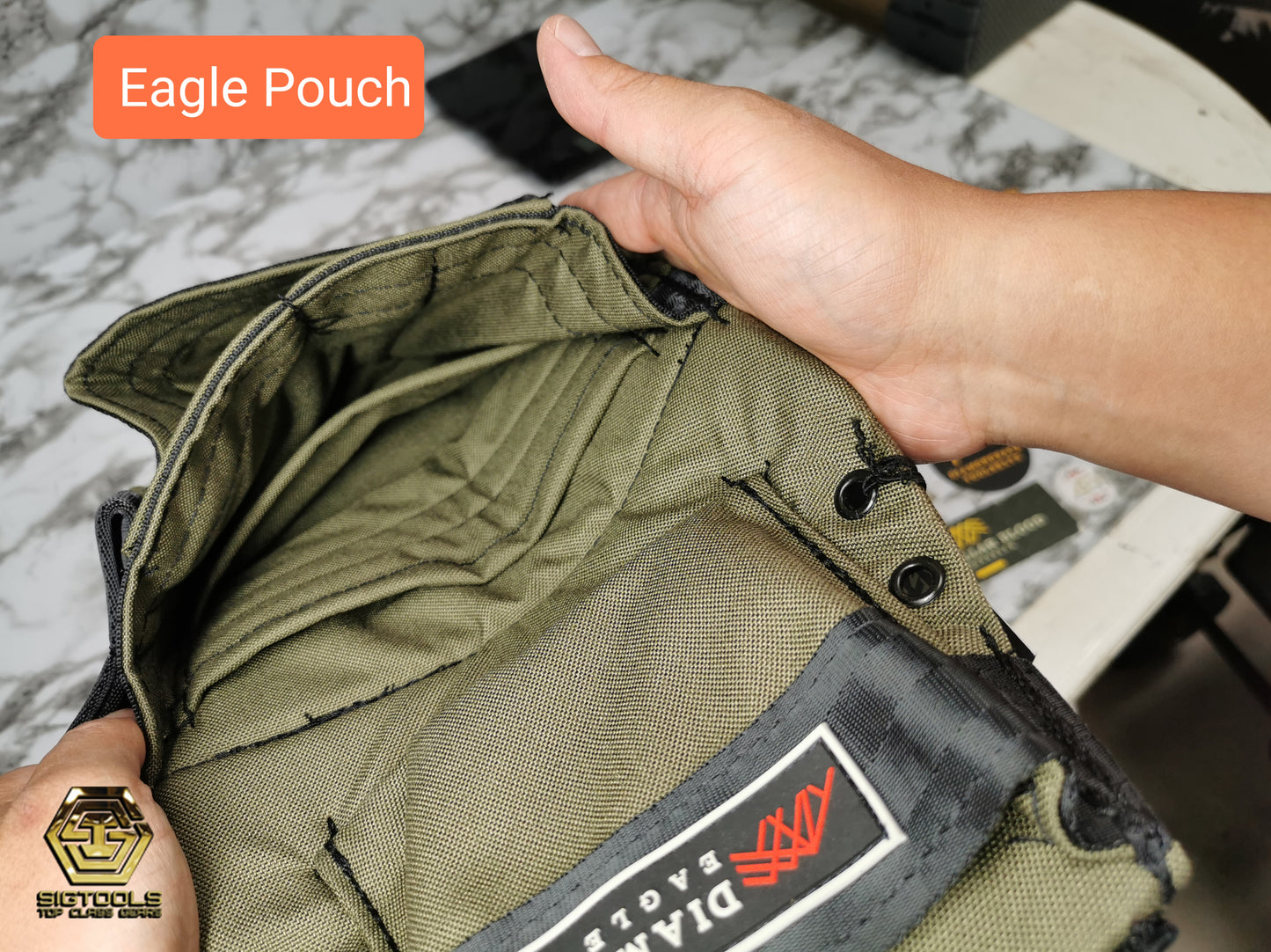 "Diamondback Eagle Pouch in hand- inside of pocket View"