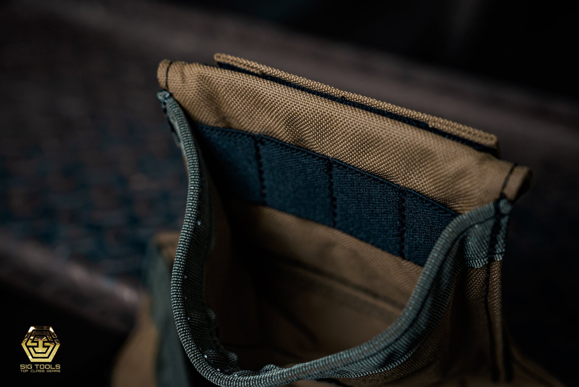 A close-up view of the Bit Index pocket on the Sawdust Sage Carpenter Fastener Bag by Badger, highlighting its practicality for organising and accessing various bits and fasteners.