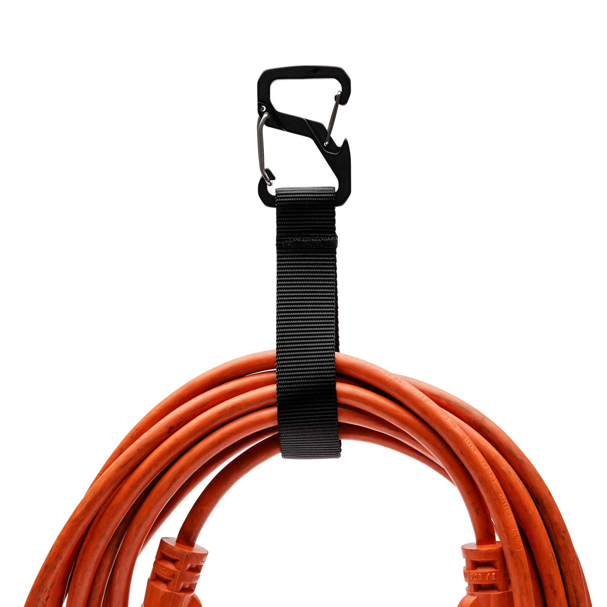 A set of air hoses hanging neatly using the Diamondback Carabiner Cord Loop 2.0 for storage.