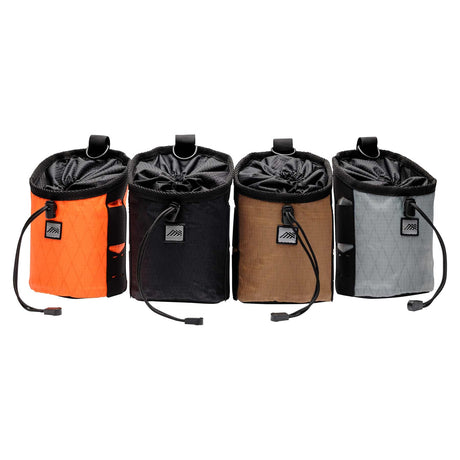The Diamondback DB Sax X DBX all-purpose pouch, shown in its four available colours: Black, Hi-Vis Orange, Tan, and Grey.