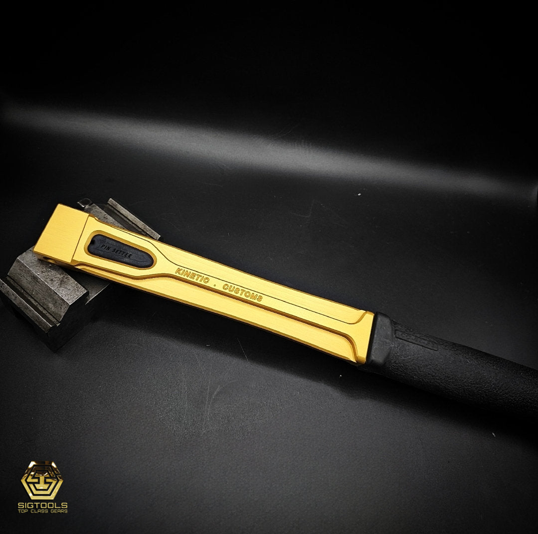 "Gold KC handle with black grip"
