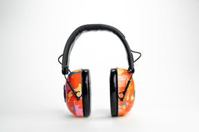Close-up of durable Orange Mufftech headset showing control buttons and padded ear cups for industrial use.