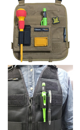 The Dura 507 holder shown attached to a DURAWORK tool panel, securely holding a marker and a screwdriver.