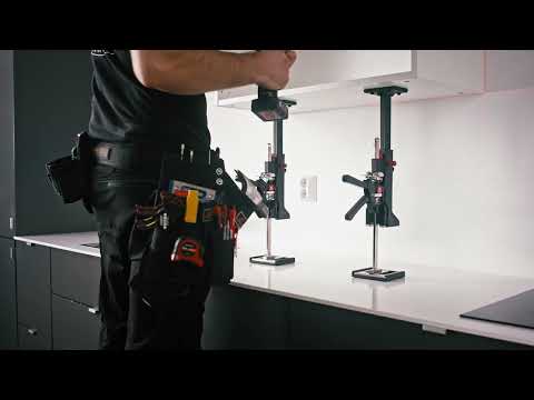 Viking Arm® Cabinet Installation Kit in action, demonstrating one-man operation for installing wall cabinets up to 60cm/23.7 inches, capable of holding objects up to 50 kg/110lbs, highlighting its efficiency and independence.